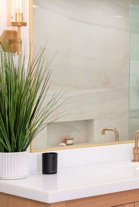 Tranquil bathroom remodeling with calming color palette and ambient lighting