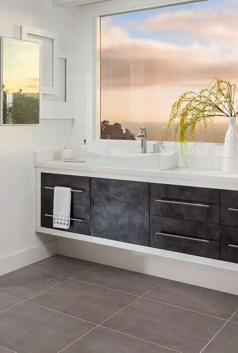 Modern bathroom design featuring walk-in shower and sleek fixtures