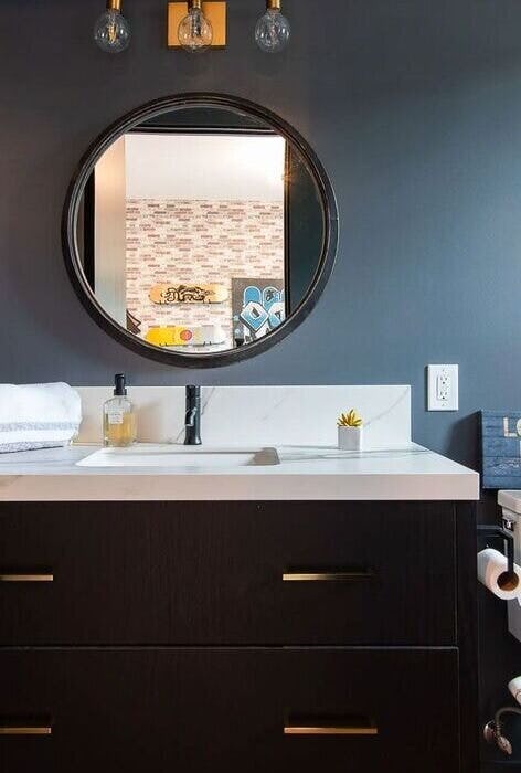 Stunning bathroom renovation emphasizing natural lighting and minimalist design